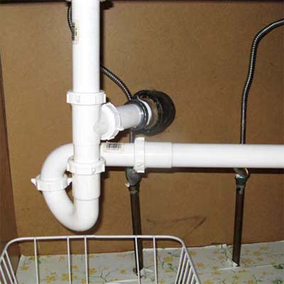some creative plumbing found under a sink
