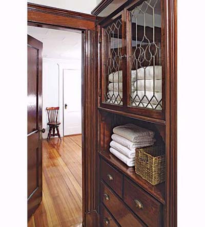 china cabinet turned linen closet