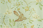 detail of hand drawn bird and floral stencil