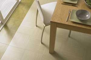 two types of vinyl tile flooring on a kitchen floor