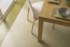two types of vinyl tile flooring on a kitchen floor