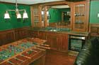 basement family room with pool table