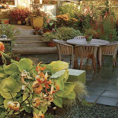  Lots Furniture on Concrete Paver Patio With Wood Patio Furniture  Surrounded By Colorful