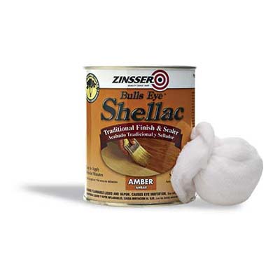 Can of Bulls Eye shellac with rag
