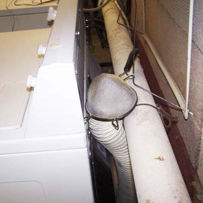 a strainer attached to the end of a dryer ventilation tube