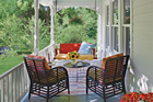 a porch in the farmhouse style
