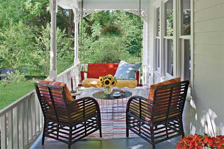 a porch in the farmhouse style