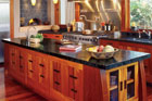 black granite stone countertop in zen-style wood kitchen
