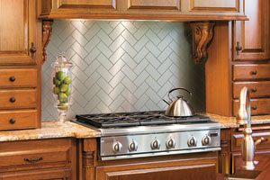 kitchen displaying peel-and-stick metallic backsplash tiles