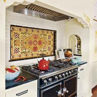 stove alcove with decorative tile backsplash