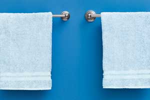 photo of two towel bars from different price ranges side by side