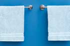 photo of two towel bars from different price ranges side by side
