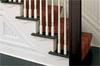 close up of decorative brackets installed as stair trim