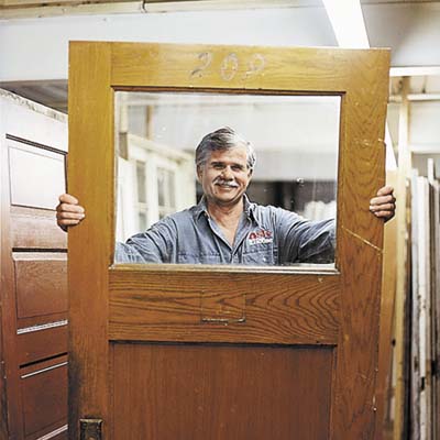 man holding the froont door