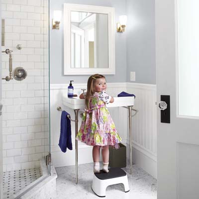 Pictures Remodeled Bathrooms on Little Girl In Front Of Console Sink In Remodeled Bathroom