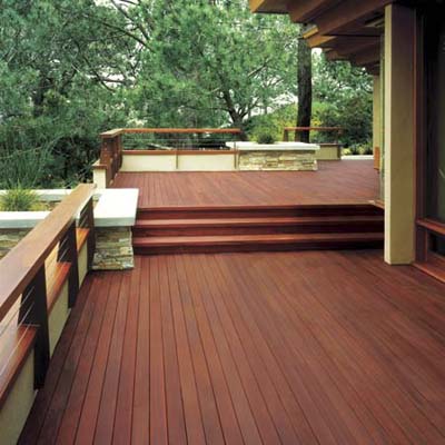 large deck with burgundy-tinted stain from Behr