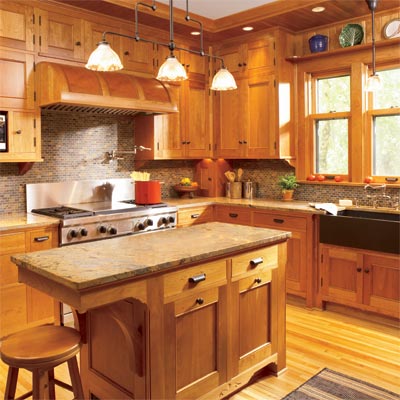 custom built cherry cabinets installed in an open kitchen