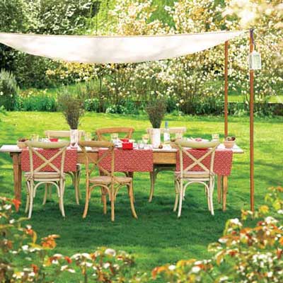 outdoor dining table covered with canopy