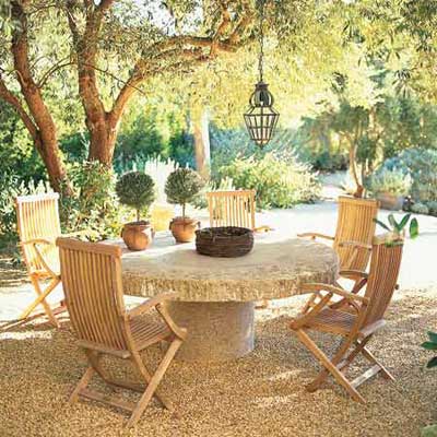 outdoor table under large shade tree