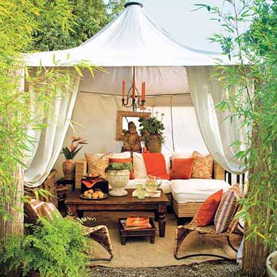 outdoor dining area under tented cabana