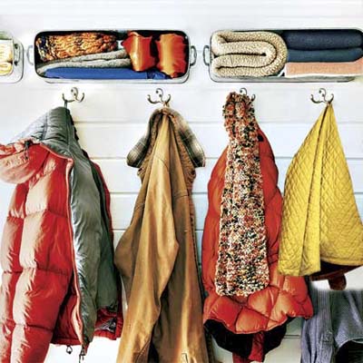 galvanized steel beverage tubs mounted to provide storage shelving over coat hooks