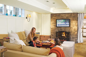 teens enjoying their basement turned family room