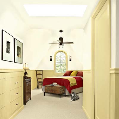 open layout master bedroom with skylight from a remodeled attic