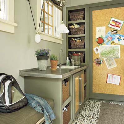 mudroom with sink, pantry and storage