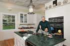 man and his son at the kitchen island in a made over kitchen