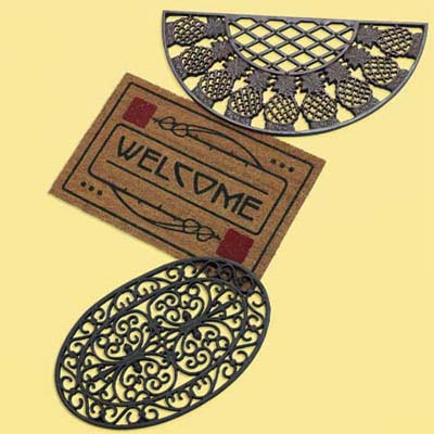 three distinctive doormats; welcome mats