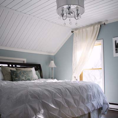 Bedroom Light Fixture on Updated Bedroom With Sloped White Ceiling And Chandelier Light Fixture