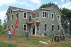 men working on house