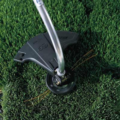 string trimmer cutting grass