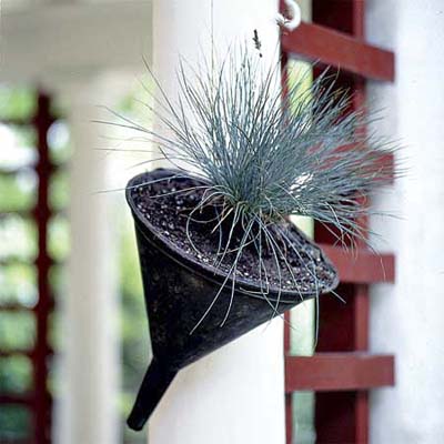 Metal funnel turned hanging planter from thisoldhouse.com
