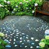 broken ceramic tiles create a celestial-inspired pattern