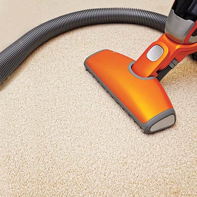 vacuuming carpet 