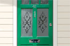 entry door with etched glass window panels