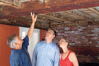Page family examines the interior of the  Bedford homestead