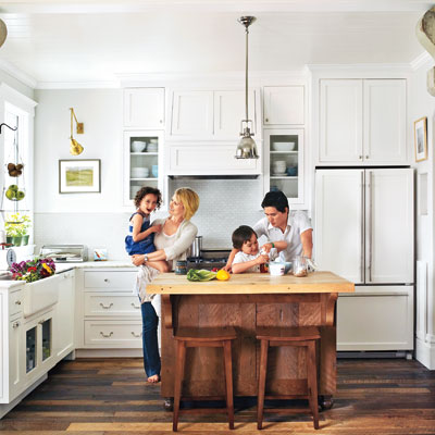 The Miller Pelaez family in their remodeled kitchen