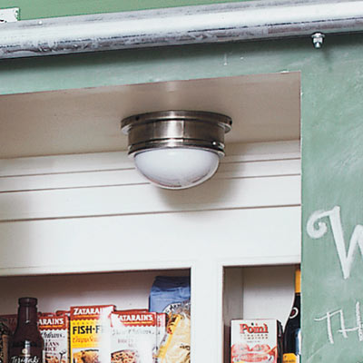 shallow space saving pantry with low profile lighting