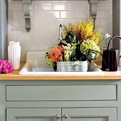 plumbed hutch potting room with rugged rimmed sink
