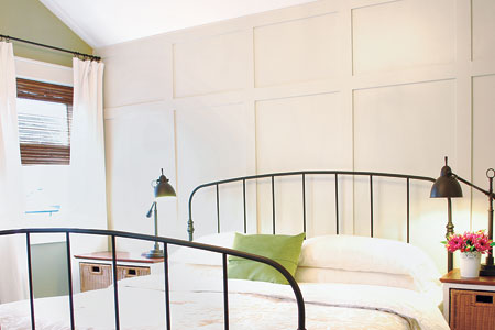 The Malinek's remodeled master bedroom with paneled wall