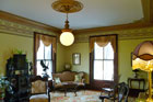 a family room remodeled in a Victorian parlor style