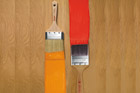 paintbrushes dipped in paint
