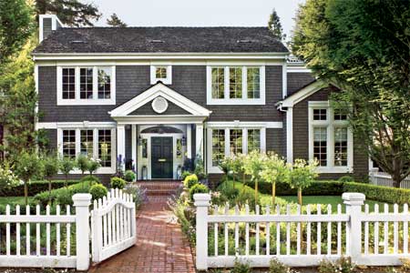 exterior shot of a remodeled and light-filled colonial style home