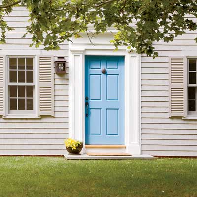 blue front door personalized with paint
