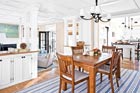 a bungalow dining room open to kitchen and living room