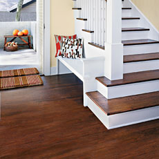 hardwood floor by a stairwell