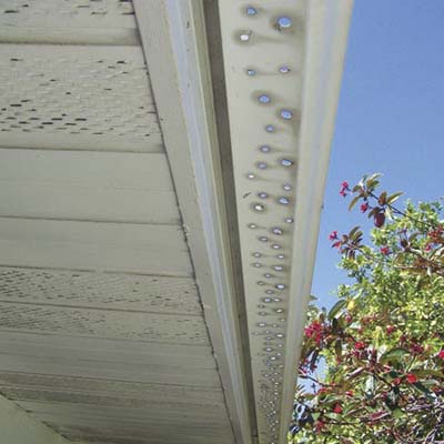 gutter with holes punched out of it