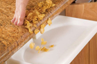 vacuum drawer sweeping up crumbs